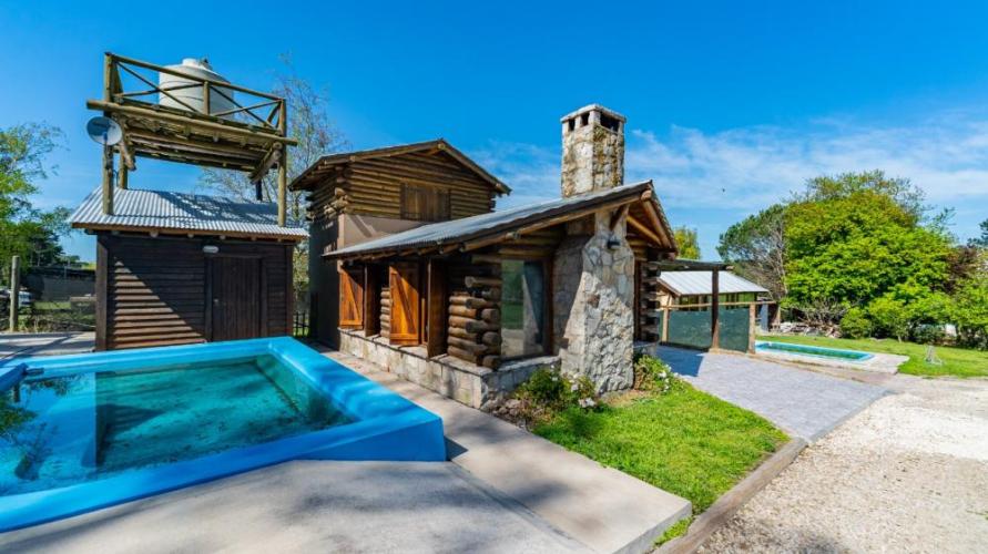 Cabañas con piscina compartida y terraza en Sierra de los Padres